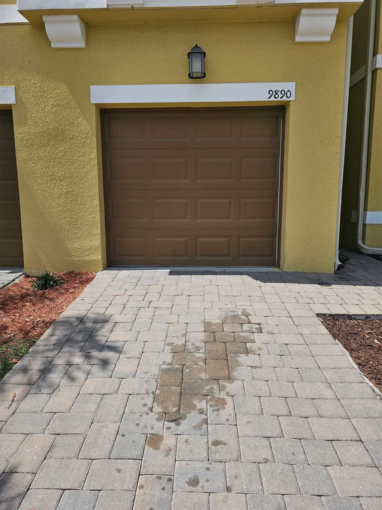 Customer Boguepressurewashing Before - Patio Garage Garden